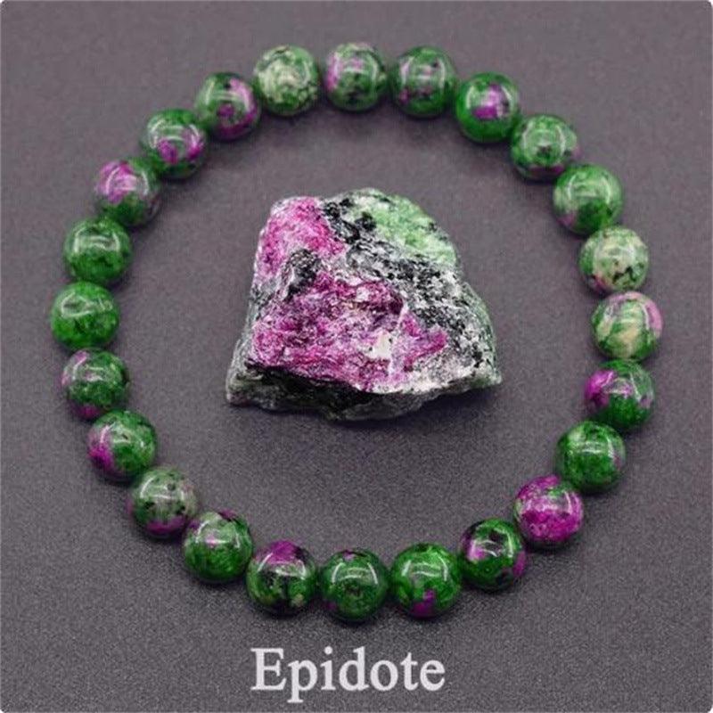 Detailed view of the Epidote bracelet, highlighting the natural harmony of green and purple shades.